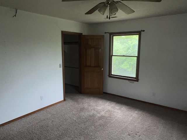 9556 N State Highway H, Pleasant Hope, MO 65725 - carpeted empty room featuring a ceiling fan and baseboards