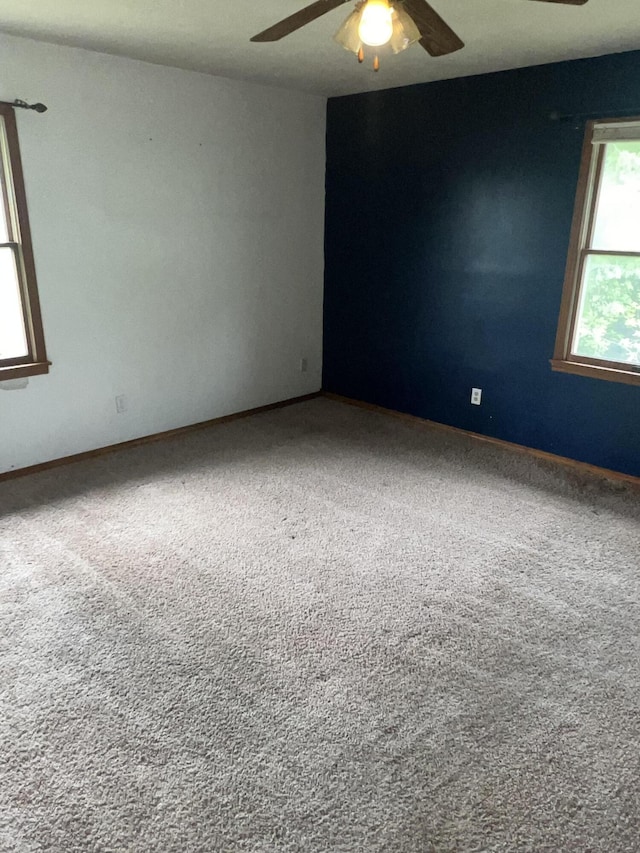 9556 N State Highway H, Pleasant Hope, MO 65725 - carpeted spare room with ceiling fan and baseboards