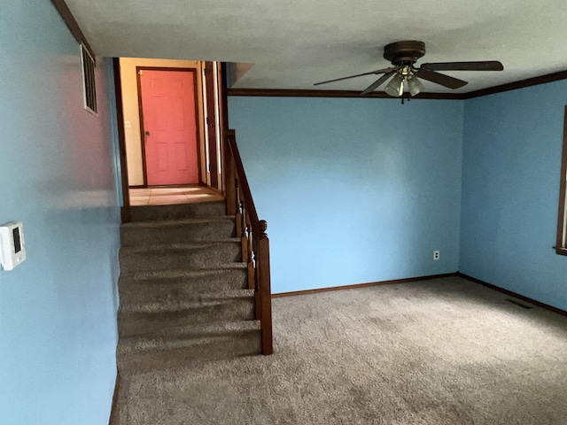 9556 N State Highway H, Pleasant Hope, MO 65725 - staircase featuring a ceiling fan, carpet flooring, ornamental molding, and baseboards