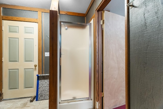 bathroom featuring a stall shower