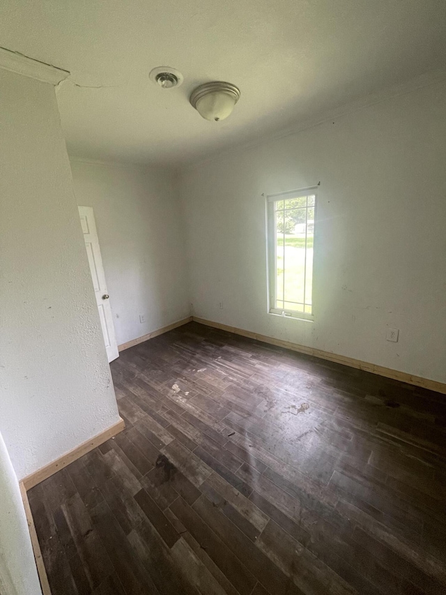 421 N Phelps St, Mansfield, MO 65704 - unfurnished room featuring dark wood-style floors and baseboards