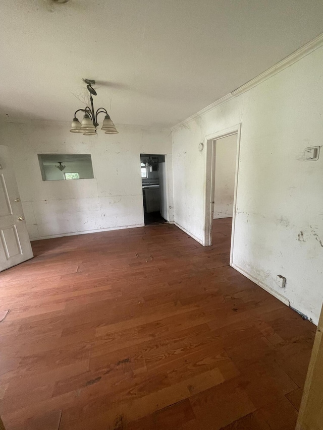 421 N Phelps St, Mansfield, MO 65704 - unfurnished dining area with dark wood-style floors and a chandelier