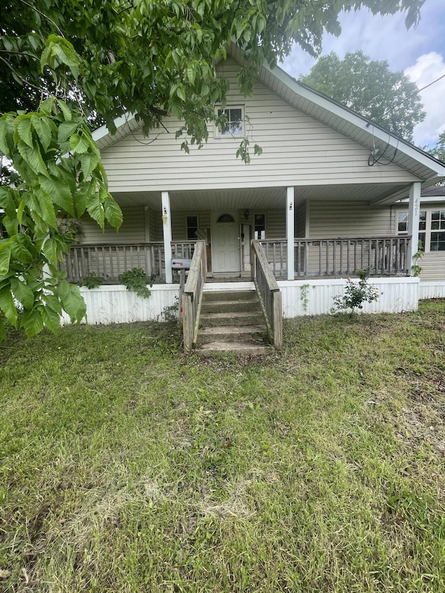 421 N Phelps St, Mansfield, MO 65704 - view of front of property with covered porch and a front yard