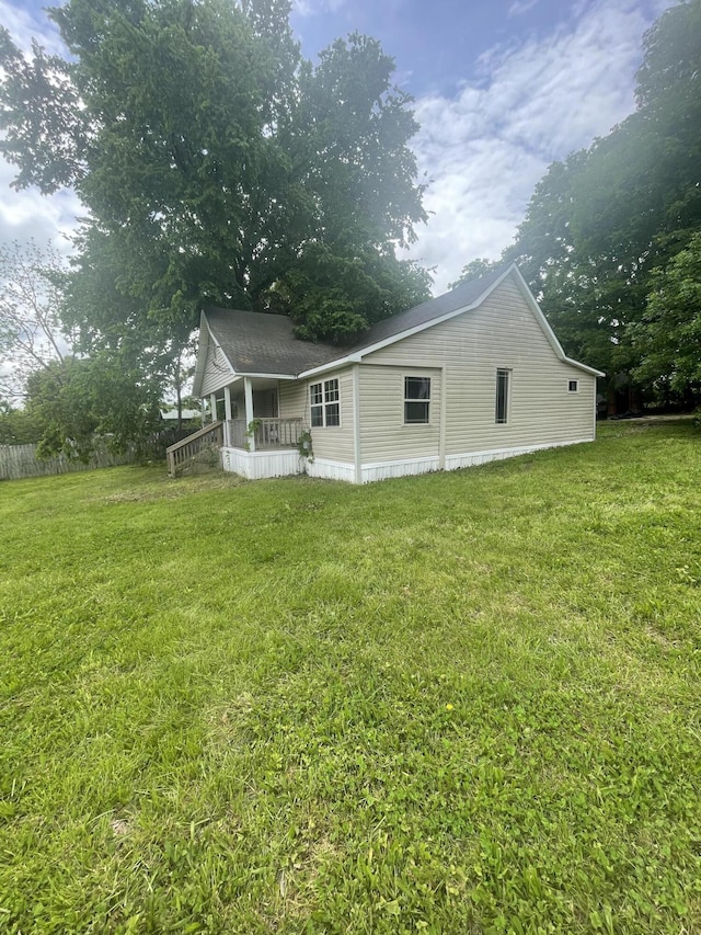 421 N Phelps St, Mansfield, MO 65704 - view of side of property featuring a yard and a porch