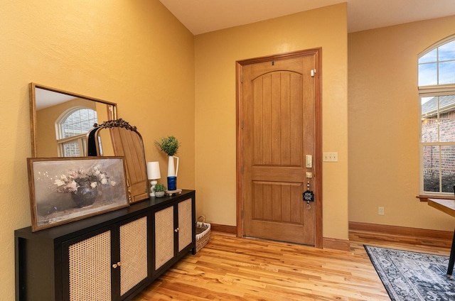 143 Woodfield Dr, Highlandville, MO 65669 - entryway with light wood-style flooring and baseboards