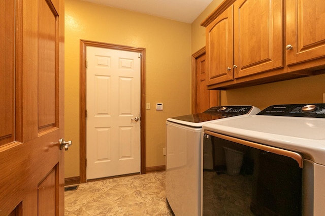143 Woodfield Dr, Highlandville, MO 65669 - laundry room featuring independent washer and dryer and cabinet space