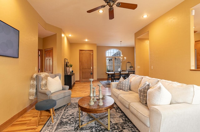 143 Woodfield Dr, Highlandville, MO 65669 - living area with light wood finished floors, a ceiling fan, a chandelier, baseboards, and recessed lighting