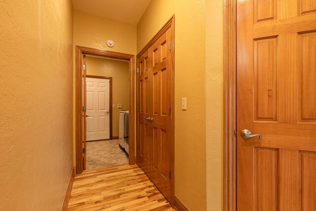 143 Woodfield Dr, Highlandville, MO 65669 - hall featuring a textured wall and light wood-style floors