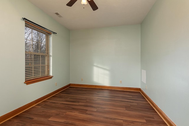 143 Woodfield Dr, Highlandville, MO 65669 - unfurnished room with wood finished floors, a ceiling fan, and baseboards