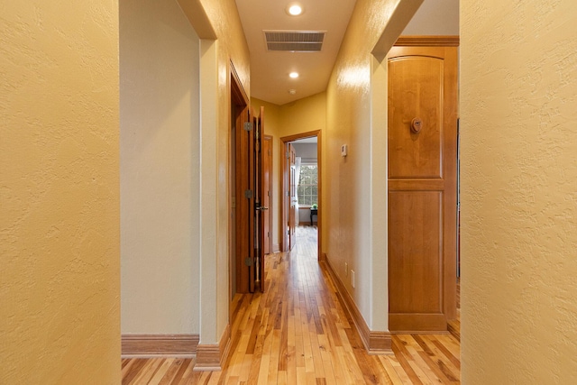 143 Woodfield Dr, Highlandville, MO 65669 - corridor featuring a textured wall, light wood-style flooring, baseboards, and recessed lighting
