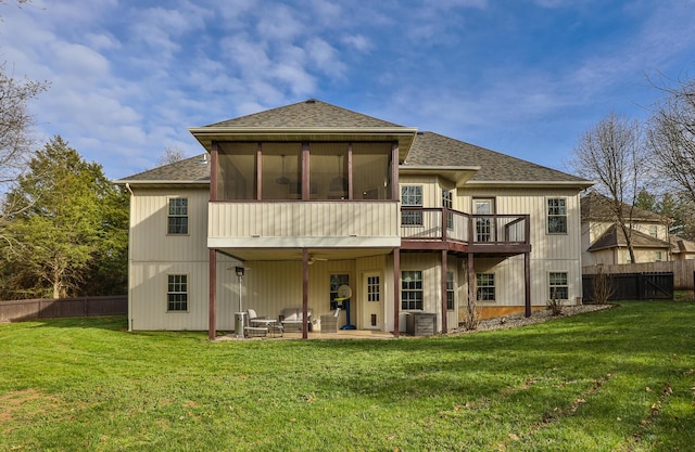 143 Woodfield Dr, Highlandville, MO 65669 - back of house with a patio area, roof with shingles, a sunroom, a wooden deck, and a ceiling fan