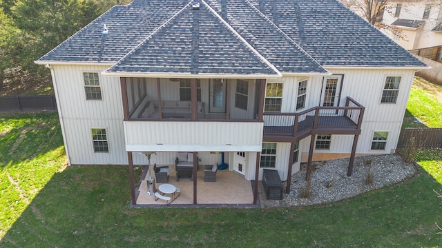 143 Woodfield Dr, Highlandville, MO 65669 - back of house featuring a patio area, roof with shingles, and a sunroom