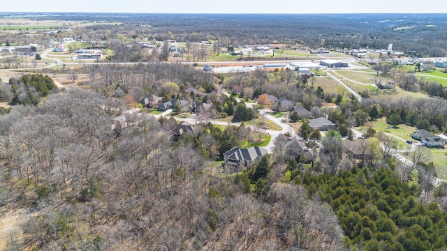 143 Woodfield Dr, Highlandville, MO 65669 - aerial overview of property's location featuring a heavily wooded area