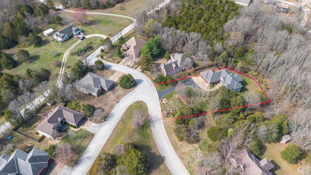 143 Woodfield Dr, Highlandville, MO 65669 - aerial perspective of suburban area featuring property boundaries highlighted