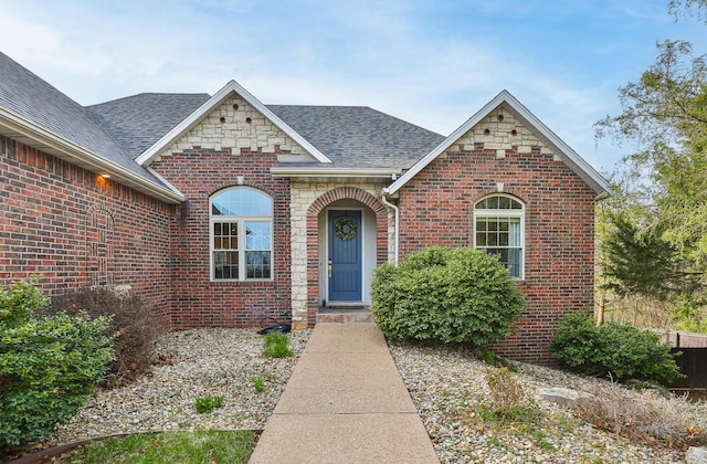 143 Woodfield Dr, Highlandville, MO 65669 - view of front of property with roof with shingles and brick siding