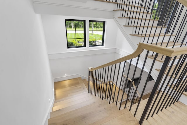 273 Secret Ln, Branson West, MO 65737 - staircase featuring wood finished floors and baseboards