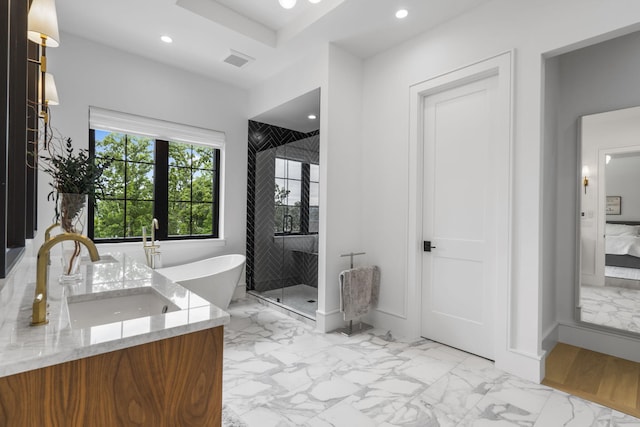 273 Secret Ln, Branson West, MO 65737 - ensuite bathroom with marble finish floors, a stall shower, recessed lighting, vanity, and a soaking tub