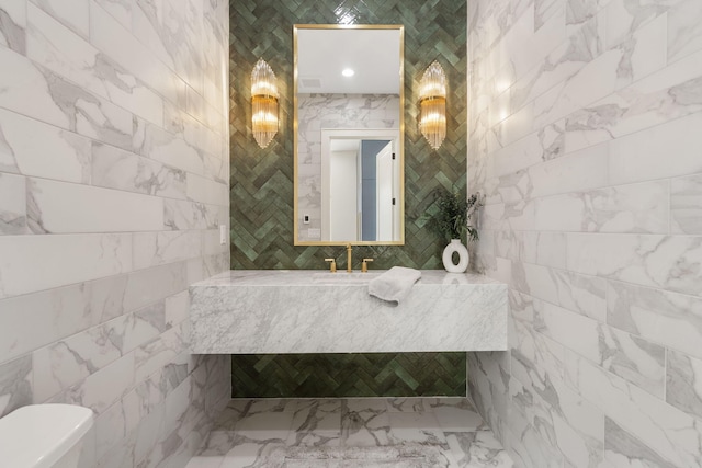 273 Secret Ln, Branson West, MO 65737 - bathroom with tile walls, a sink, and toilet