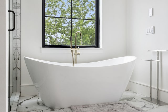 273 Secret Ln, Branson West, MO 65737 - bathroom featuring marble finish floors and a soaking tub