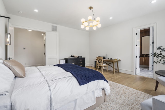 273 Secret Ln, Branson West, MO 65737 - bedroom with light wood-style floors, recessed lighting, a chandelier, baseboards, and a barn door