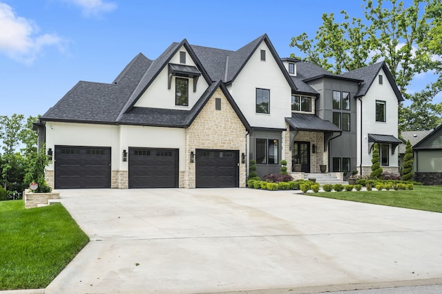 273 Secret Ln, Branson West, MO 65737 - view of front of property with stucco siding, stone siding, driveway, and a front yard