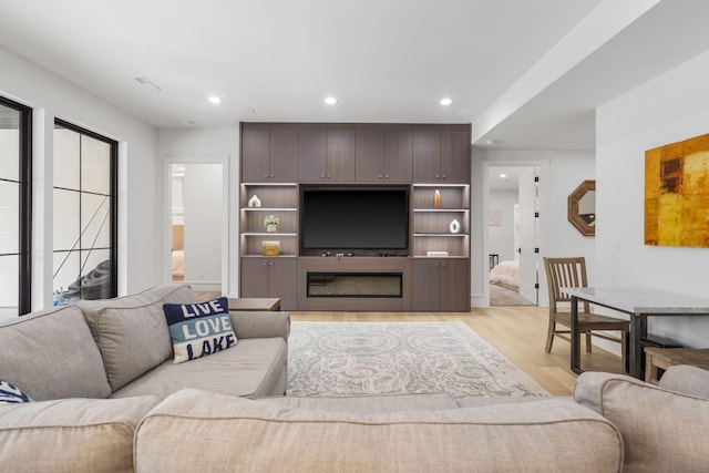 273 Secret Ln, Branson West, MO 65737 - living room featuring light wood-style flooring and recessed lighting