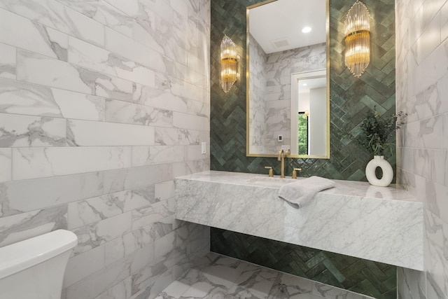 273 Secret Ln, Branson West, MO 65737 - bathroom with a sink, tile walls, and toilet