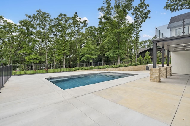 273 Secret Ln, Branson West, MO 65737 - view of swimming pool with a patio area, fence, and view of scattered trees