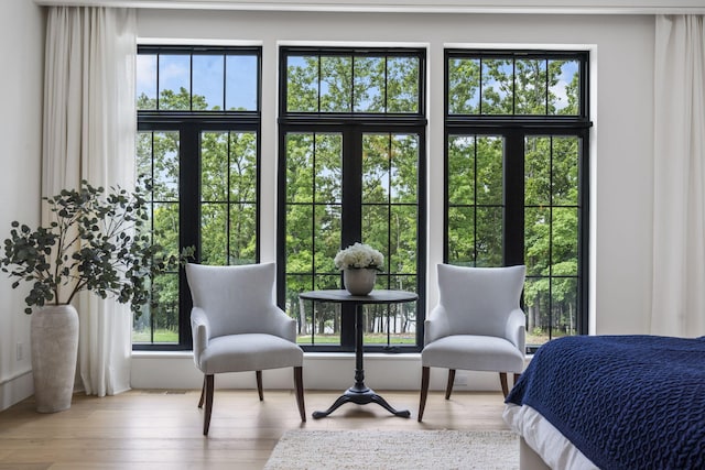 273 Secret Ln, Branson West, MO 65737 - bedroom featuring multiple windows and wood finished floors