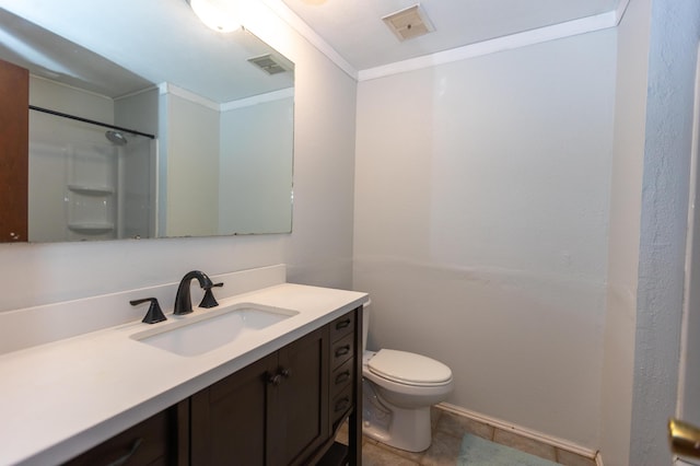 bathroom with vanity, toilet, baseboards, and a shower