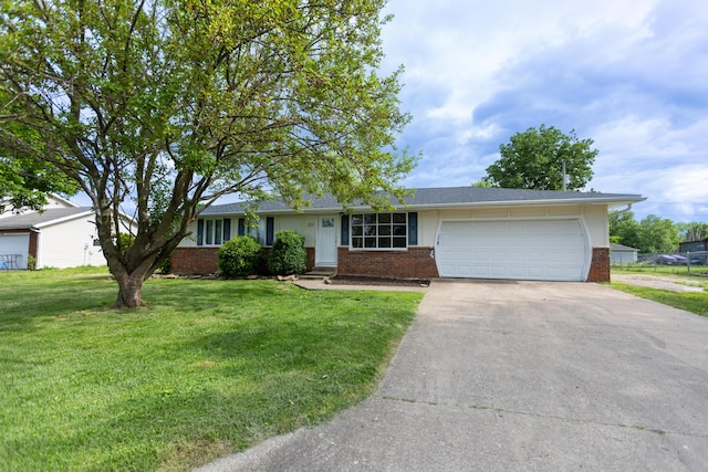 single story home featuring brick siding, driveway, an attached garage, and a front yard