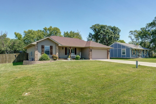 311 W Hayes Rd, Clever, MO 65631 - ranch-style house featuring an attached garage, concrete driveway, and covered porch