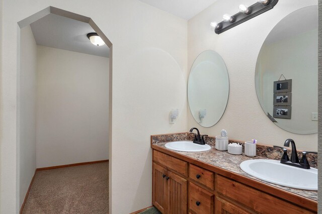 311 W Hayes Rd, Clever, MO 65631 - full bathroom with double vanity and baseboards