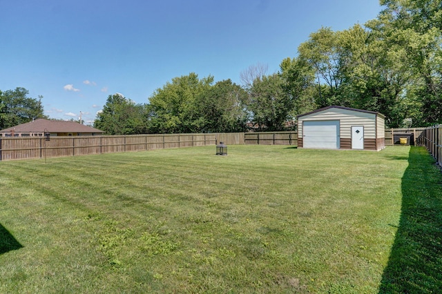 311 W Hayes Rd, Clever, MO 65631 - view of yard featuring an outbuilding, a storage shed, and a detached garage