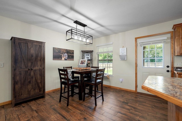 311 W Hayes Rd, Clever, MO 65631 - dining room with dark wood-style flooring and baseboards
