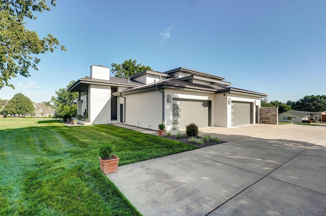 3900 E Dunrobin Dr, Springfield, MO 65809 - view of front of house with a chimney, driveway, a garage, a front lawn, and brick siding