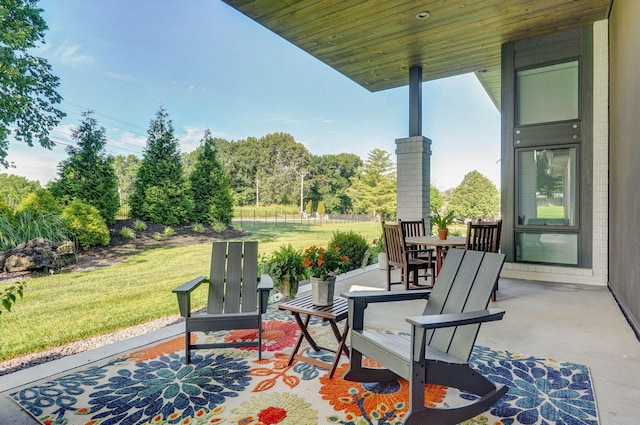 3900 E Dunrobin Dr, Springfield, MO 65809 - view of patio featuring view of wooded area