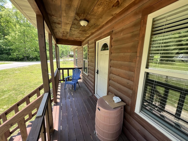 941 Peace In The Valley Rd, Blue Eye, MO 65611 - wooden terrace featuring covered porch and a lawn
