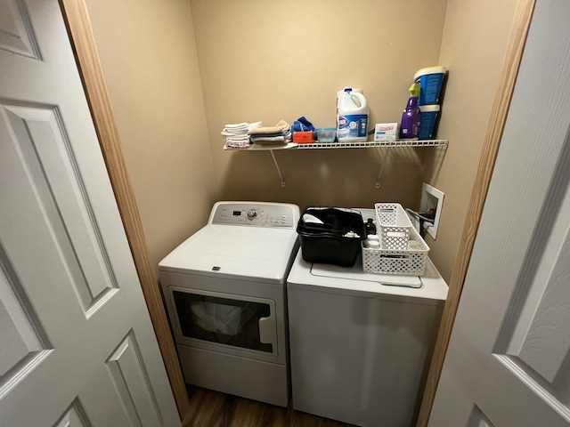941 Peace In The Valley Rd, Blue Eye, MO 65611 - washroom featuring separate washer and dryer and dark wood finished floors