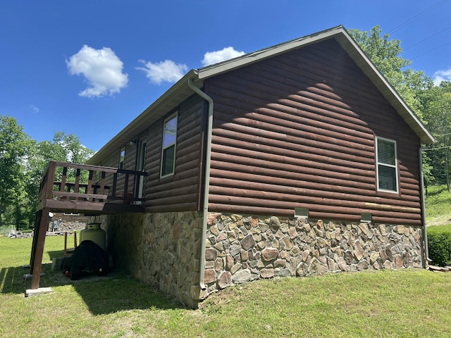 941 Peace In The Valley Rd, Blue Eye, MO 65611 - view of property exterior featuring a wooden deck, a yard, faux log siding, and stone siding