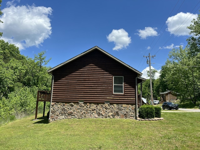941 Peace In The Valley Rd, Blue Eye, MO 65611 - view of home's exterior with a yard and faux log siding