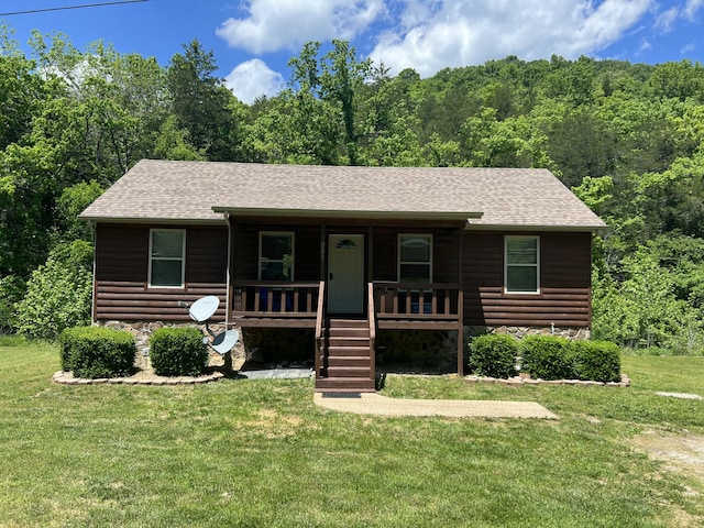941 Peace In The Valley Rd, Blue Eye, MO 65611 - view of front of property with a porch, a front lawn, log veneer siding, and a shingled roof