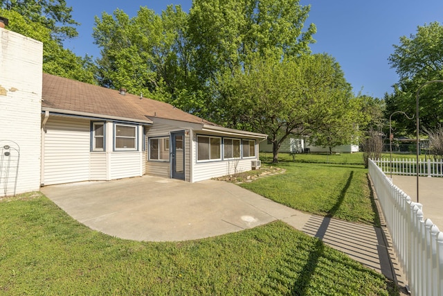 4852 S Charleston Ave, Springfield, MO 65804 - view of yard with a patio and a sunroom