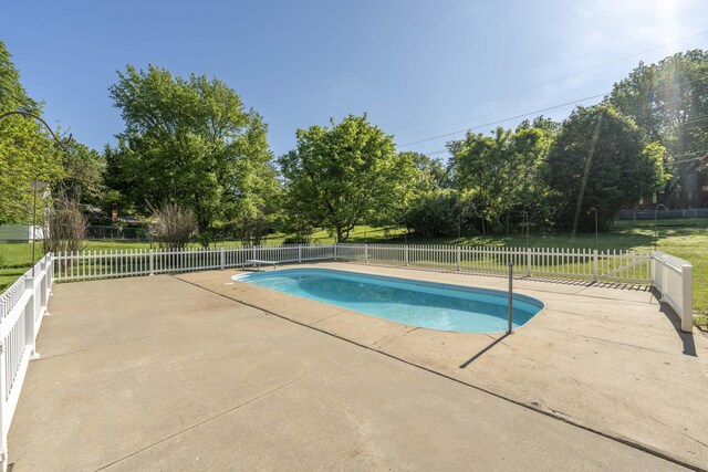 4852 S Charleston Ave, Springfield, MO 65804 - view of swimming pool with a patio and view of wooded area