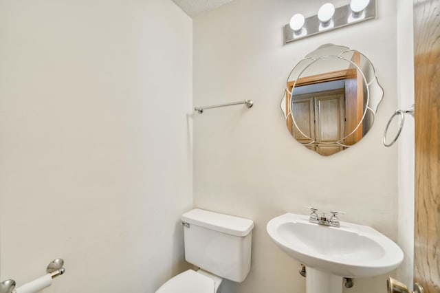 4852 S Charleston Ave, Springfield, MO 65804 - half bathroom with a sink and toilet