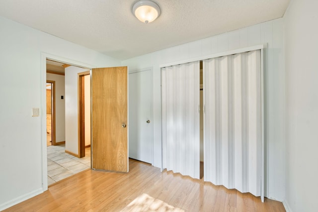 4852 S Charleston Ave, Springfield, MO 65804 - unfurnished bedroom with wood finished floors