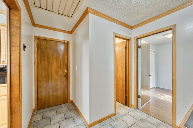 4852 S Charleston Ave, Springfield, MO 65804 - entrance foyer with ornamental molding, light tile patterned floors, and baseboards