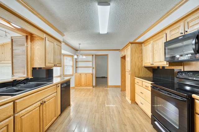 4852 S Charleston Ave, Springfield, MO 65804 - kitchen with black appliances, a sink, crown molding, a textured ceiling, and light wood-style flooring