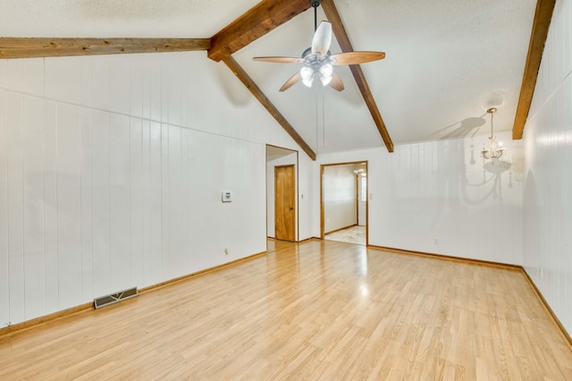 4852 S Charleston Ave, Springfield, MO 65804 - unfurnished room featuring a ceiling fan, wood finished floors, and a chandelier