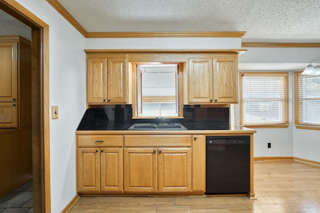 4852 S Charleston Ave, Springfield, MO 65804 - kitchen featuring black dishwasher, a sink, tile counters, tasteful backsplash, and a textured ceiling